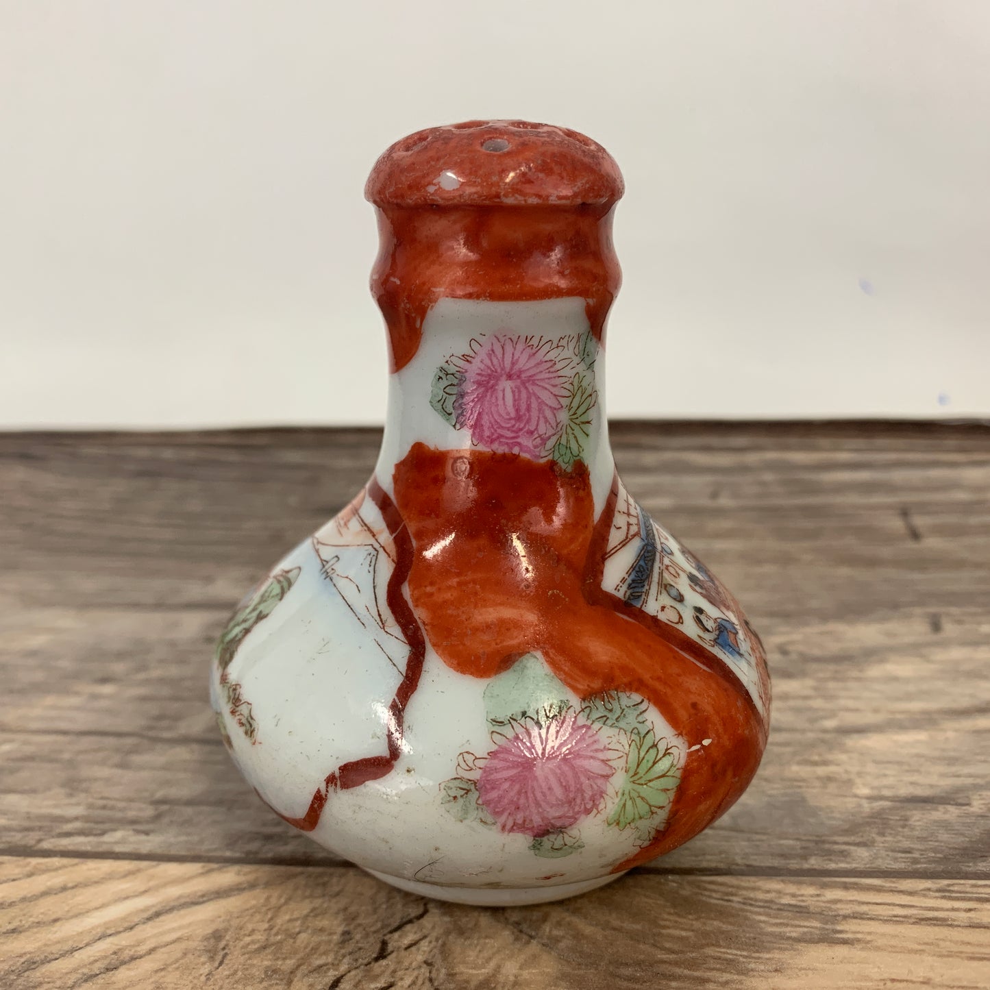 Vintage Salt Shaker with Asian Theme Design