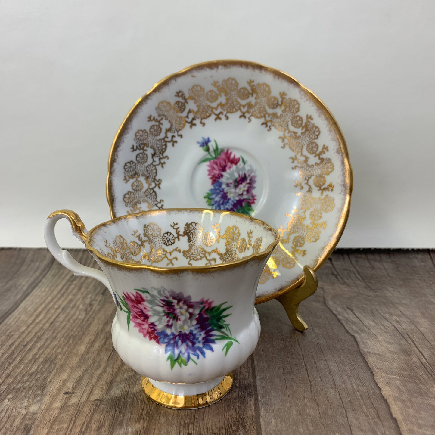 Windsor Bone China Teacup and Saucer with Gold Design, Pink, Blue, and White Floral Pattern
