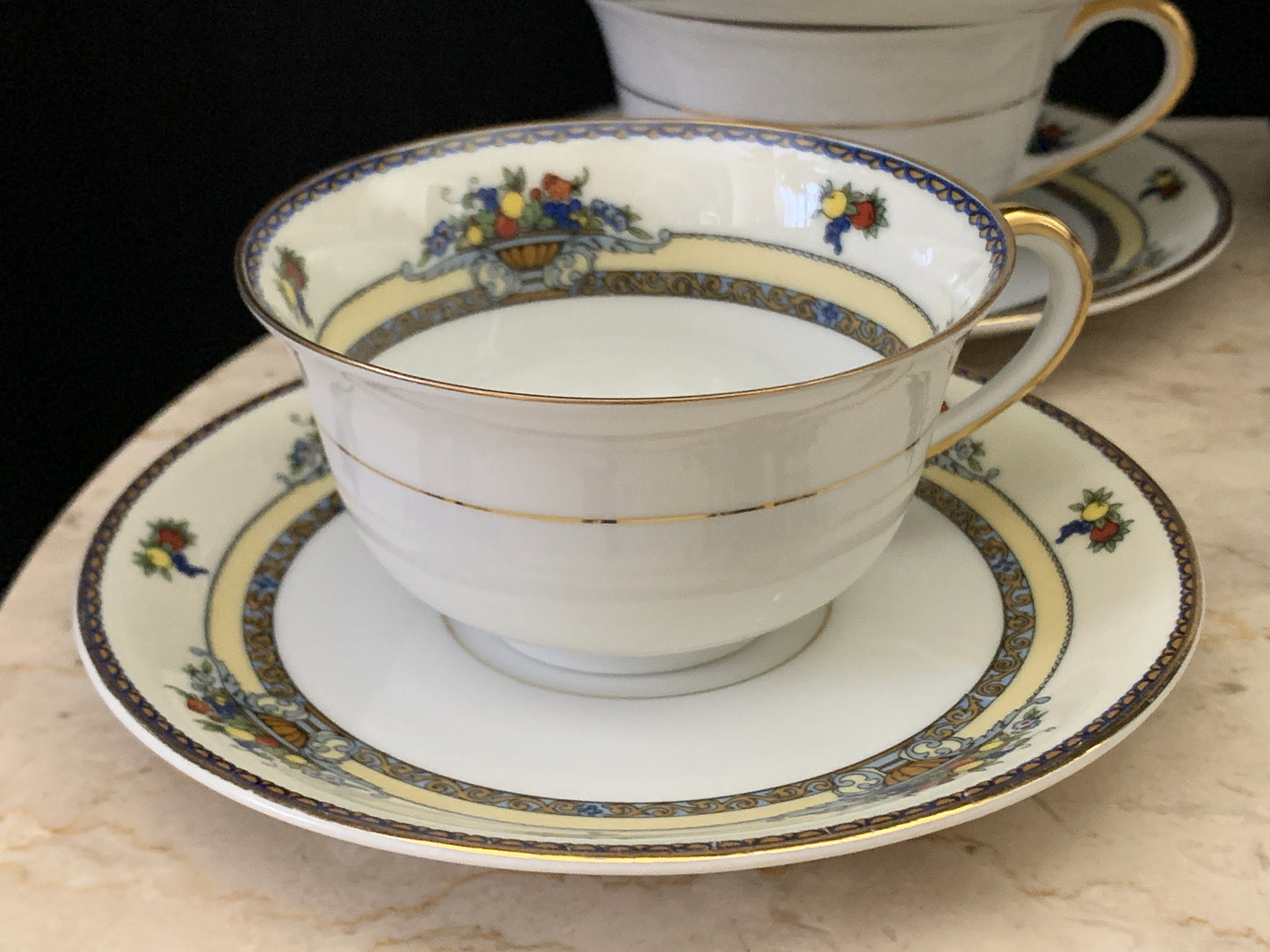 A set of 7 Vintage China Tea Cups Royal Bayruth White with Yellow, Blue, and Gold
