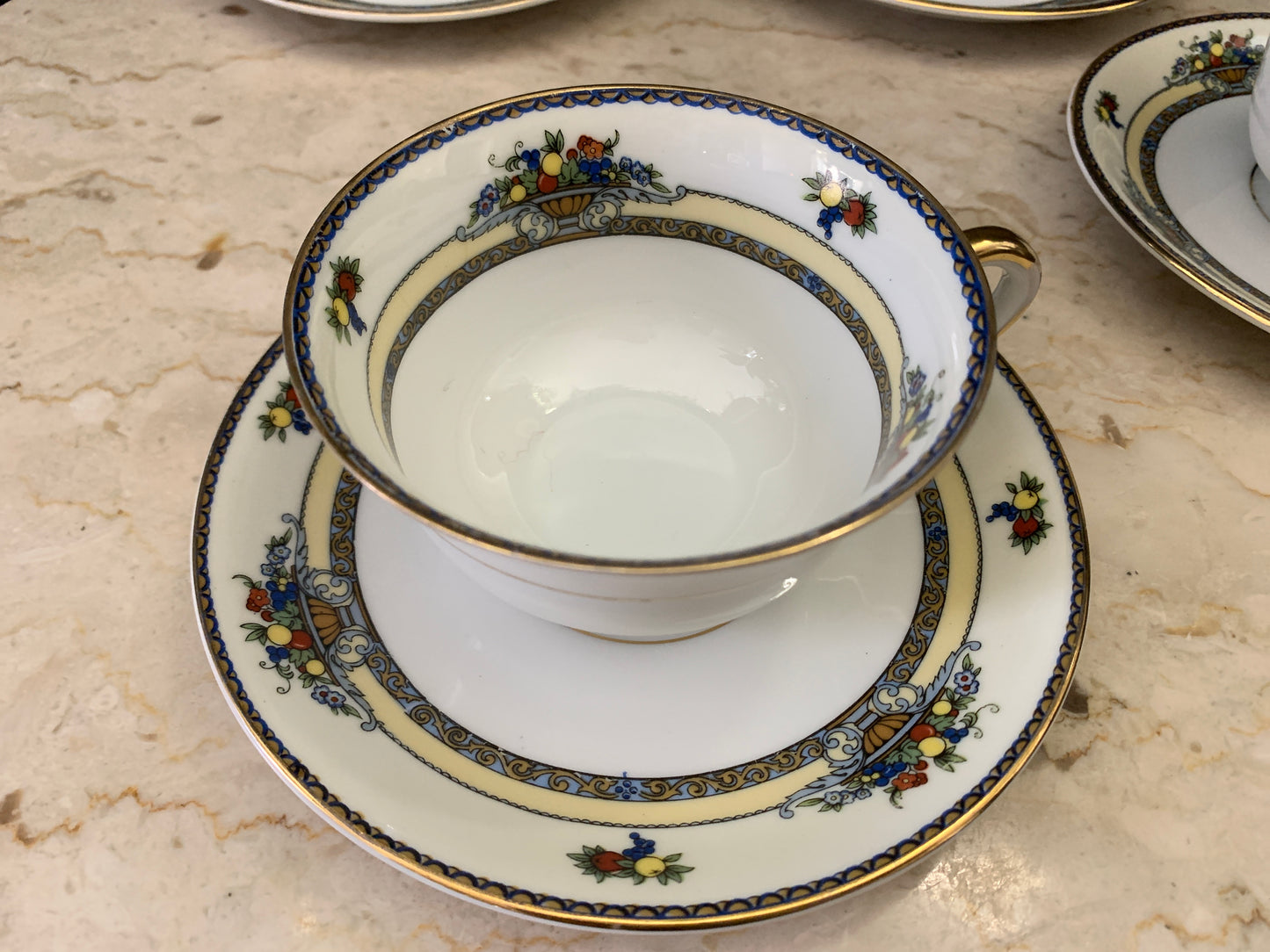 A set of 7 Vintage China Tea Cups Royal Bayruth White with Yellow, Blue, and Gold