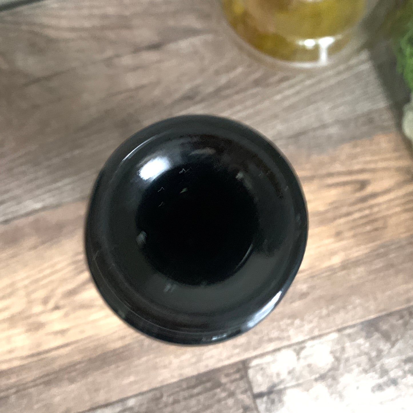 Vintage Black Milk Glass Bottle with Roman Appliqué