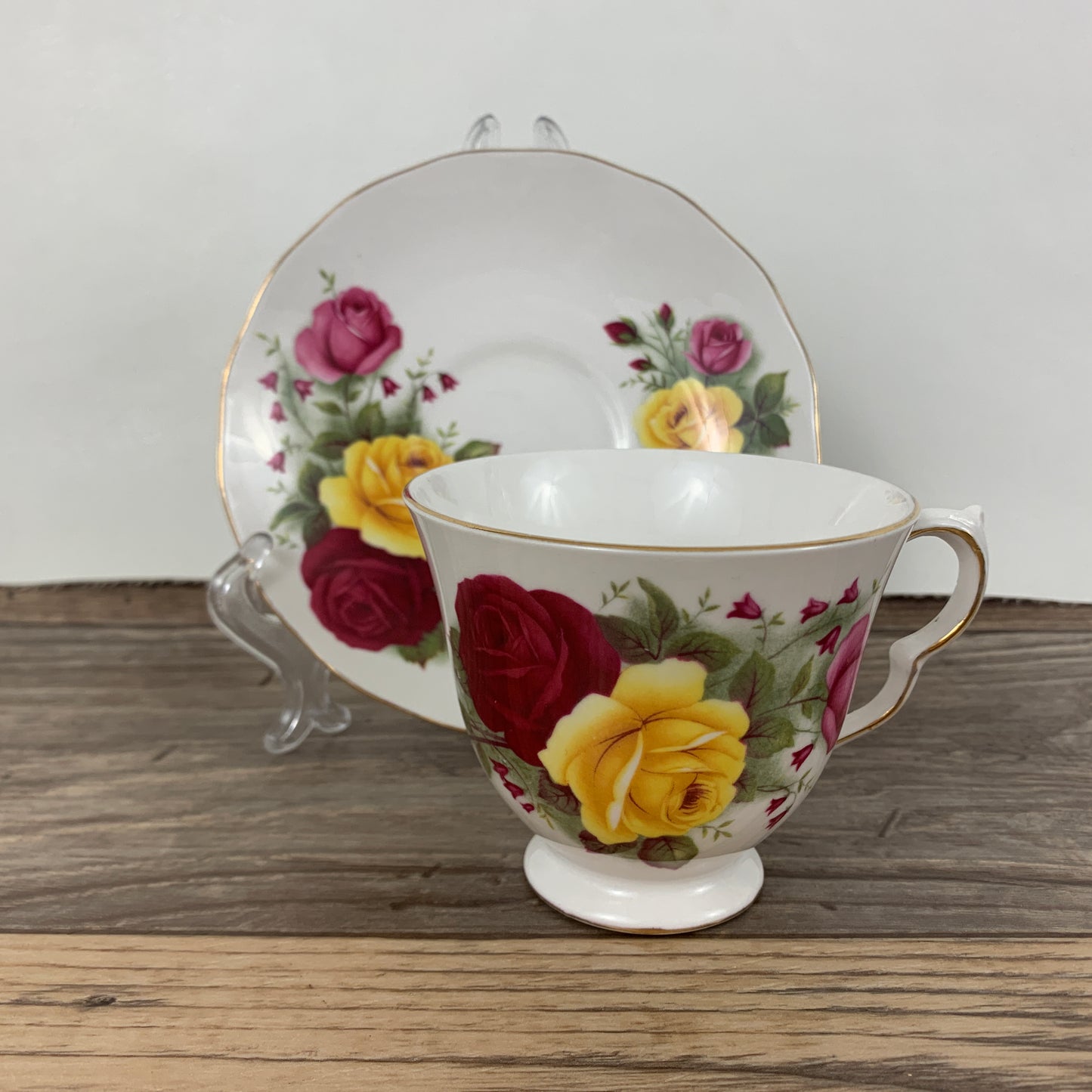 Queen Anne Vintage Teacup with Red, Yellow, and Pink Roses