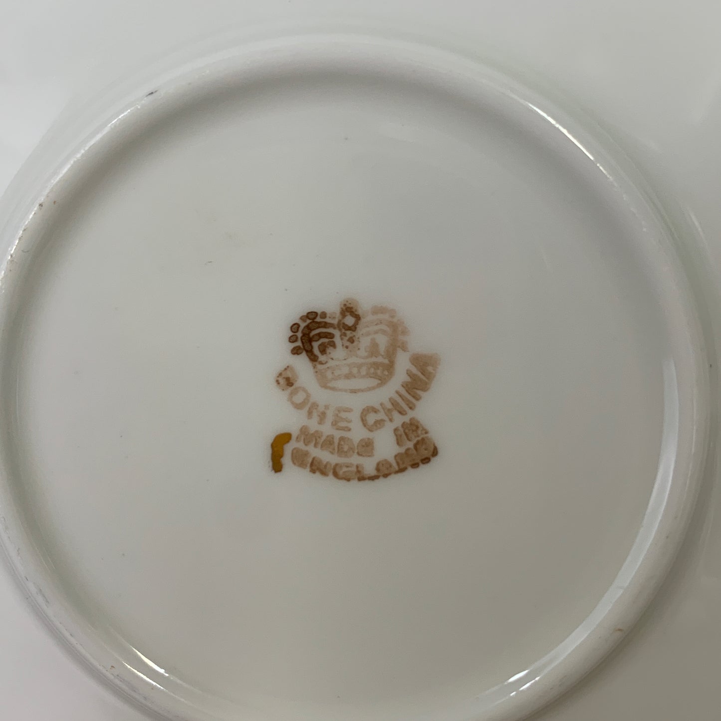 White Tea Cup with Pink Floral Design and Scalloped Edge