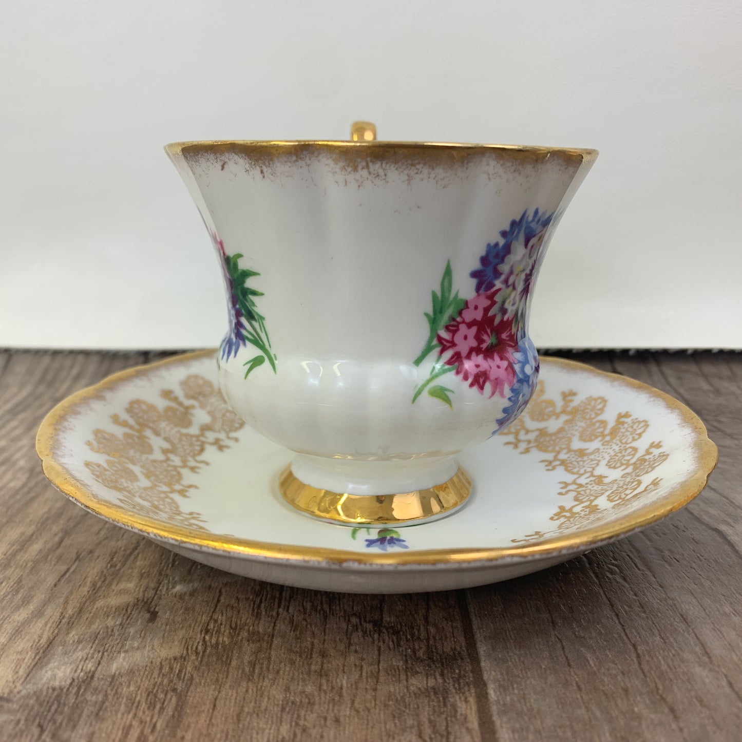Windsor Bone China Teacup and Saucer with Gold Design, Pink, Blue, and White Floral Pattern