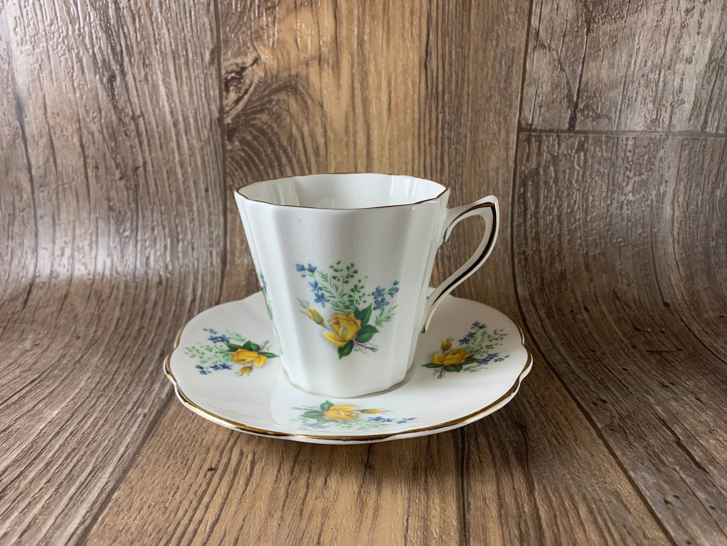 Yellow and Blue Floral Teacup and Saucer