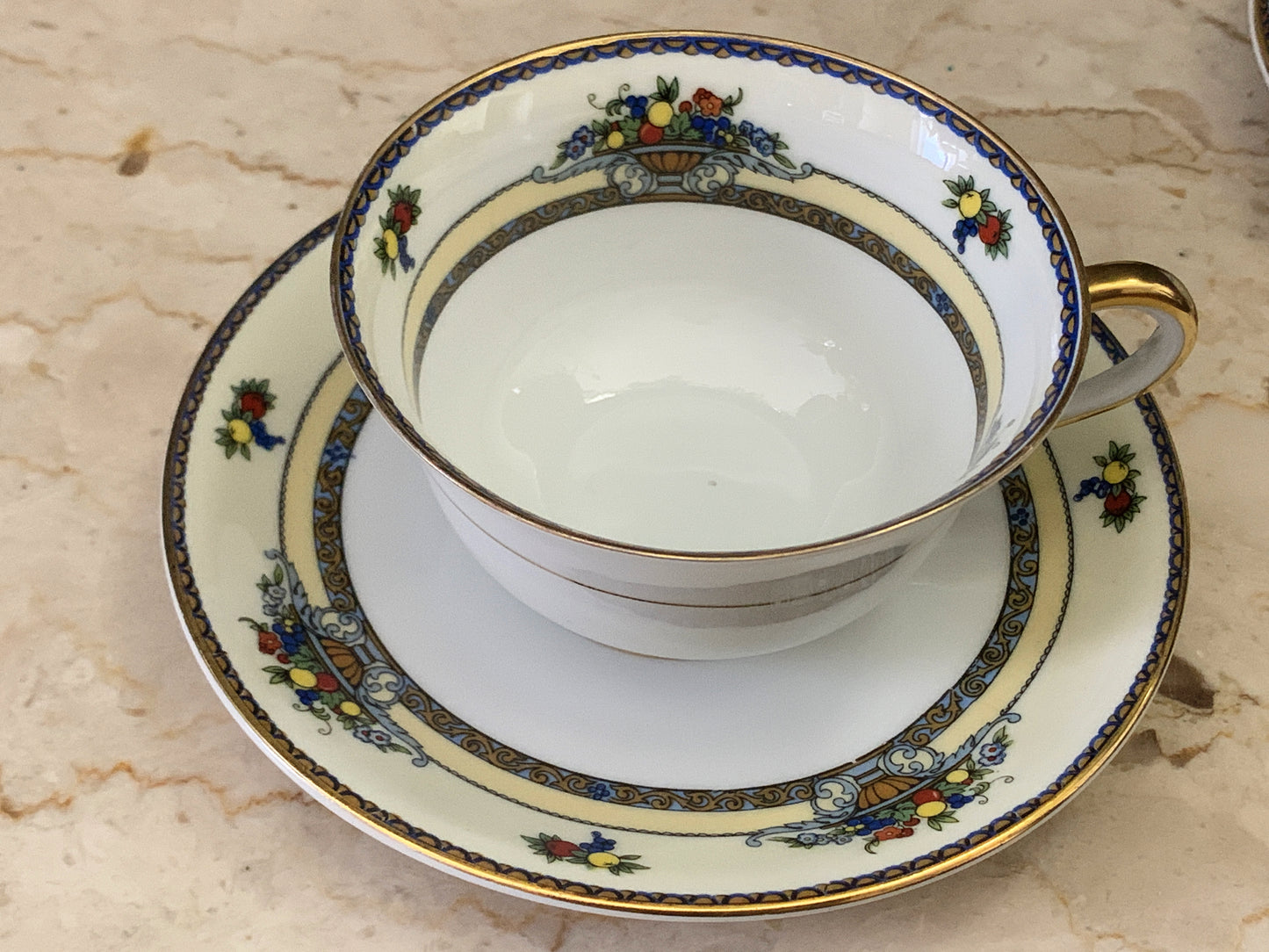 A set of 7 Vintage China Tea Cups Royal Bayruth White with Yellow, Blue, and Gold