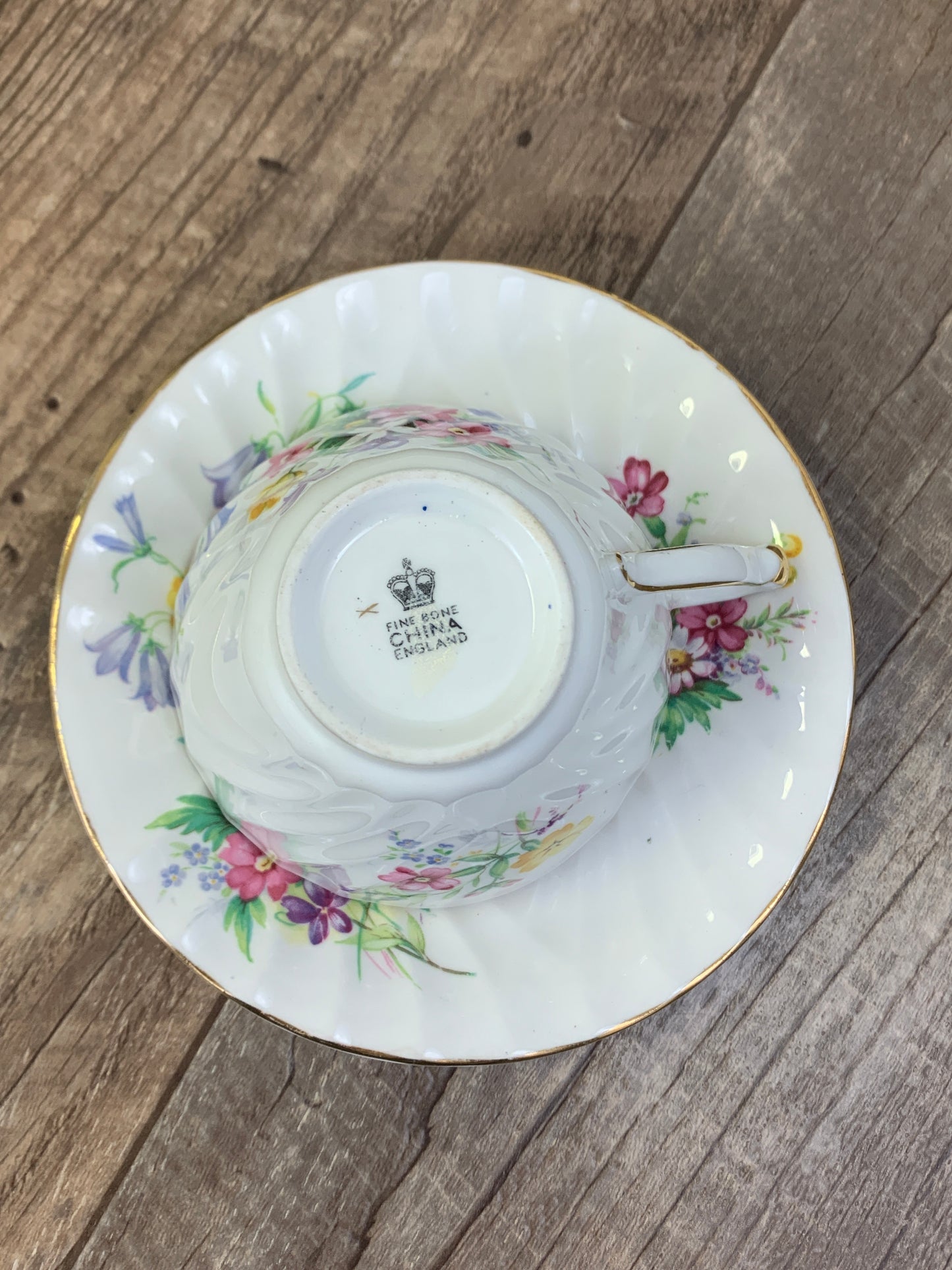 White Vintage Teacup with Floral Pattern Swirled Rib Colourful Flowers
