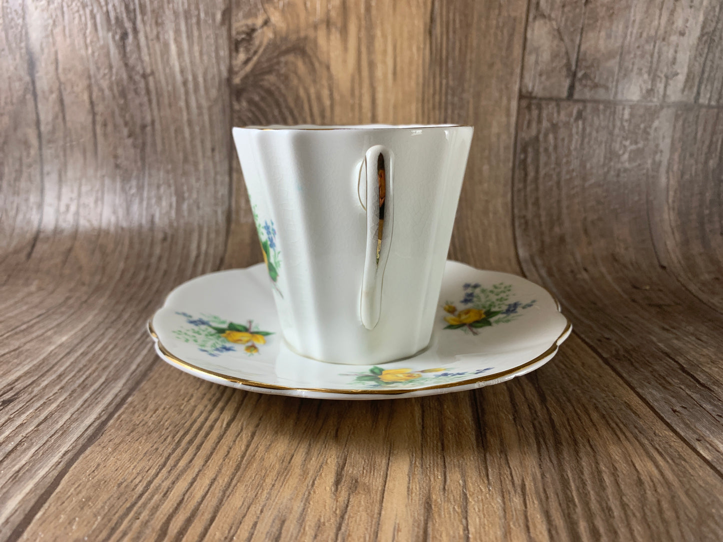 Yellow and Blue Floral Teacup and Saucer