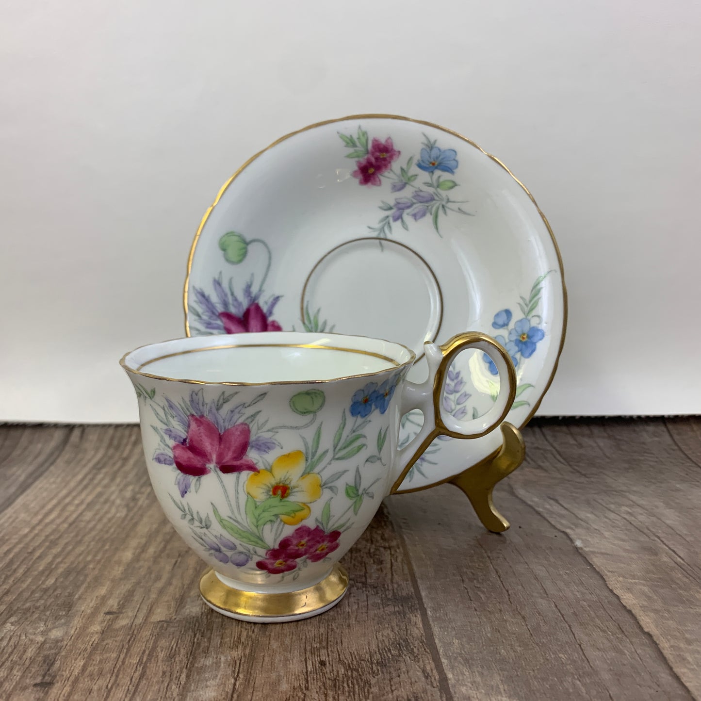 Vintage Teacup Delphine China Hand Painted Tea Cup Pink, Blue, and Yellow Floral Pattern