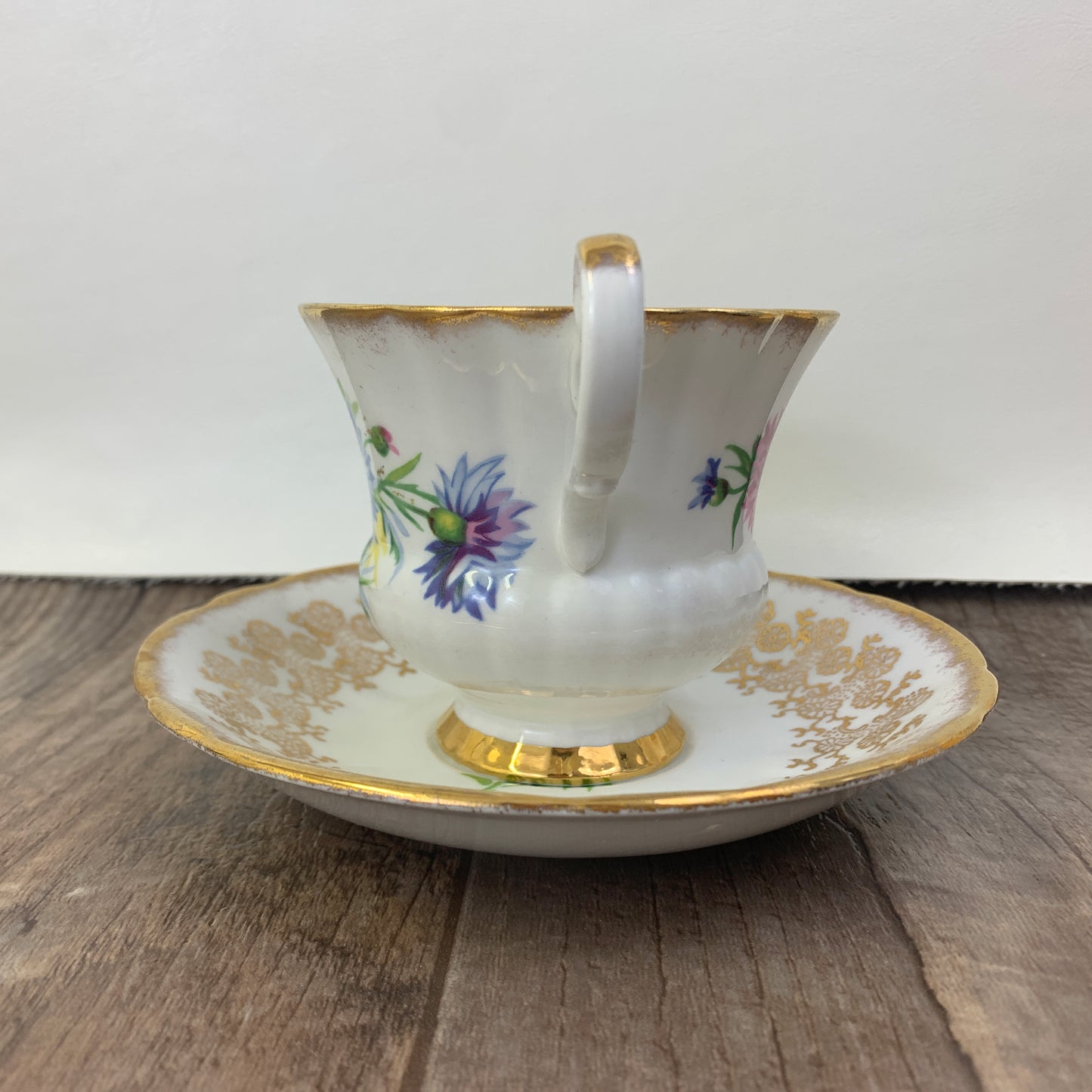 Windsor Bone China Teacup and Saucer with Gold Design, Pink, Blue, and White Floral Pattern