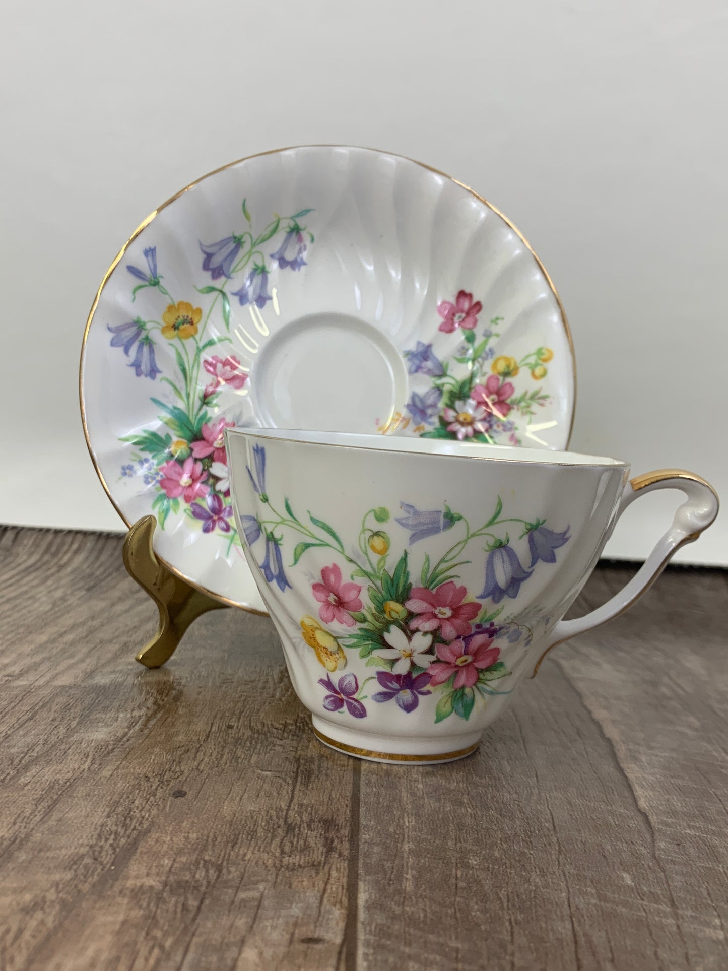 White Vintage Teacup with Floral Pattern Swirled Rib Colourful Flowers