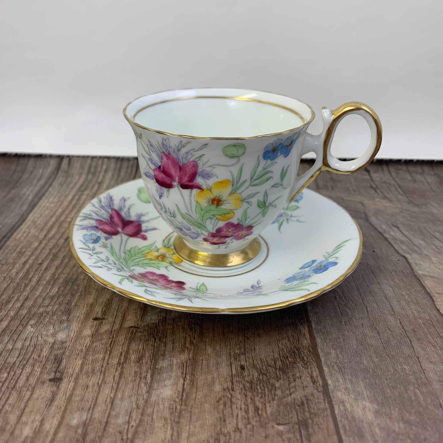 Vintage Teacup Delphine China Hand Painted Tea Cup Pink, Blue, and Yellow Floral Pattern