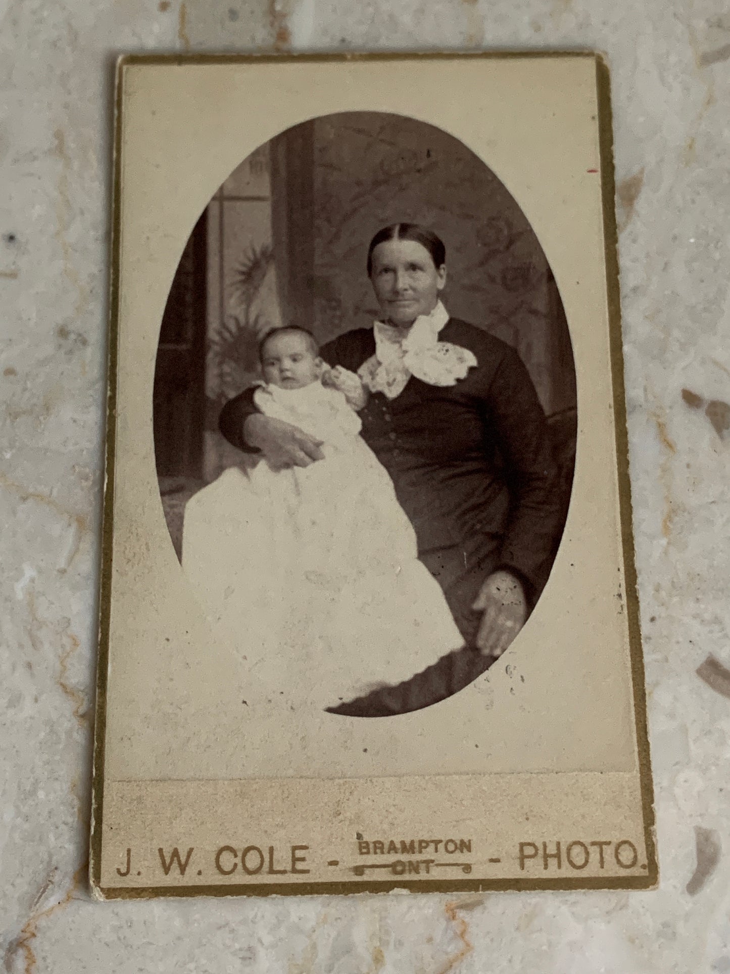 Antique Cabinet Card Person Holding a Baby