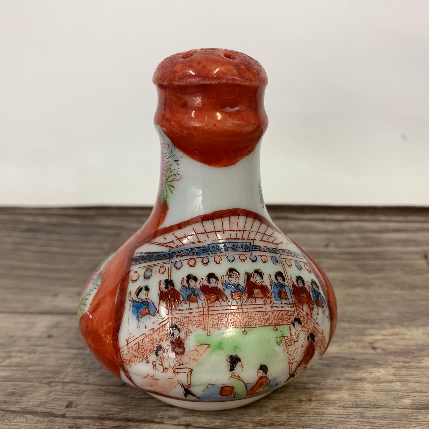 Vintage Salt Shaker with Asian Theme Design