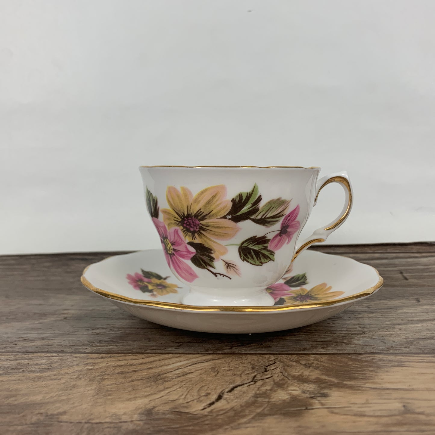 Royal Vale Vintage Teacup and Saucer Set with Pink and Yellow Floral Pattern