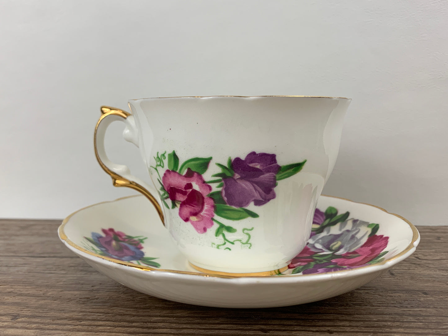 Pink, Purple, and White Floral Vintage Teacup and Saucer by Regency China