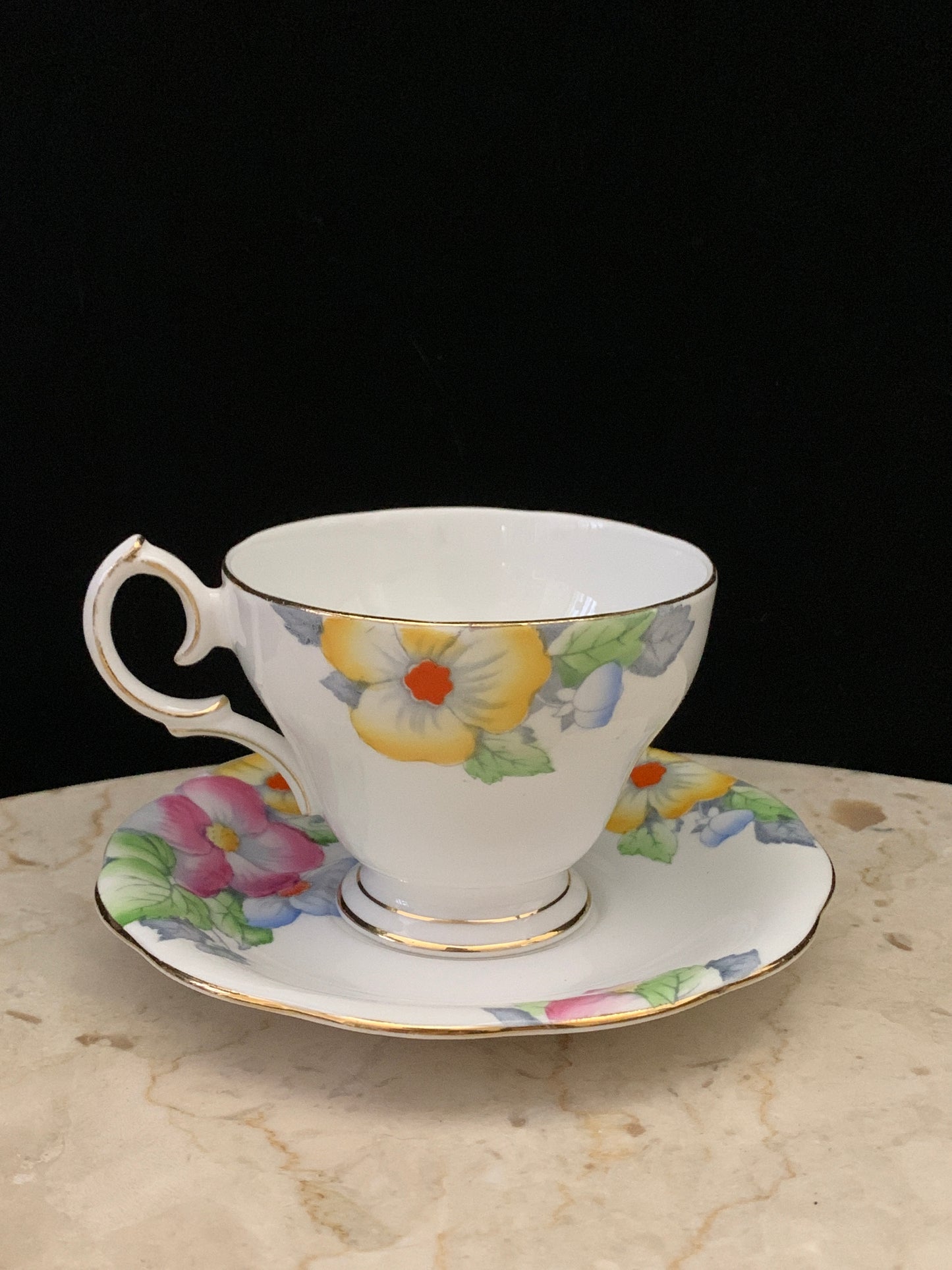 Hand Painted Blue, Pink, and Yellow Floral Tea Cup Bell China Vintage Teacup and Saucer