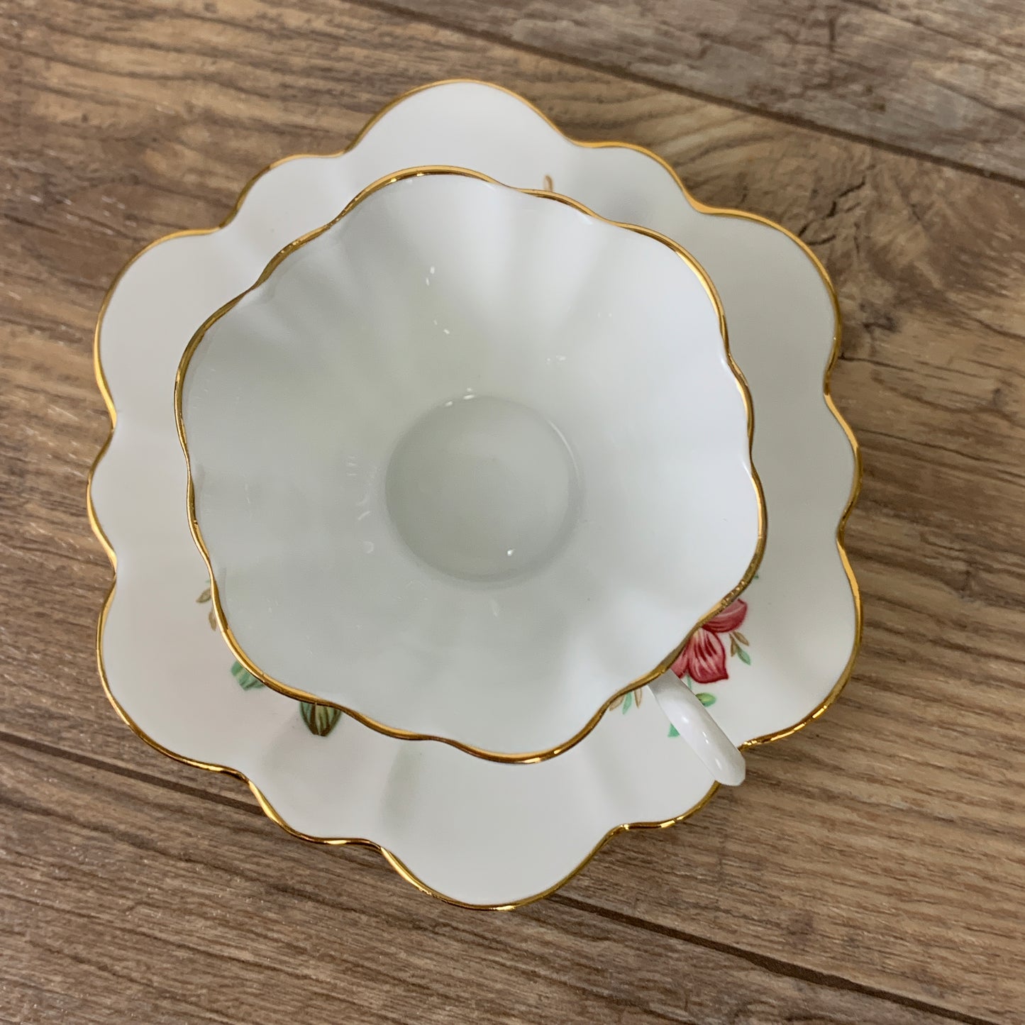 White Tea Cup with Pink Floral Design and Scalloped Edge