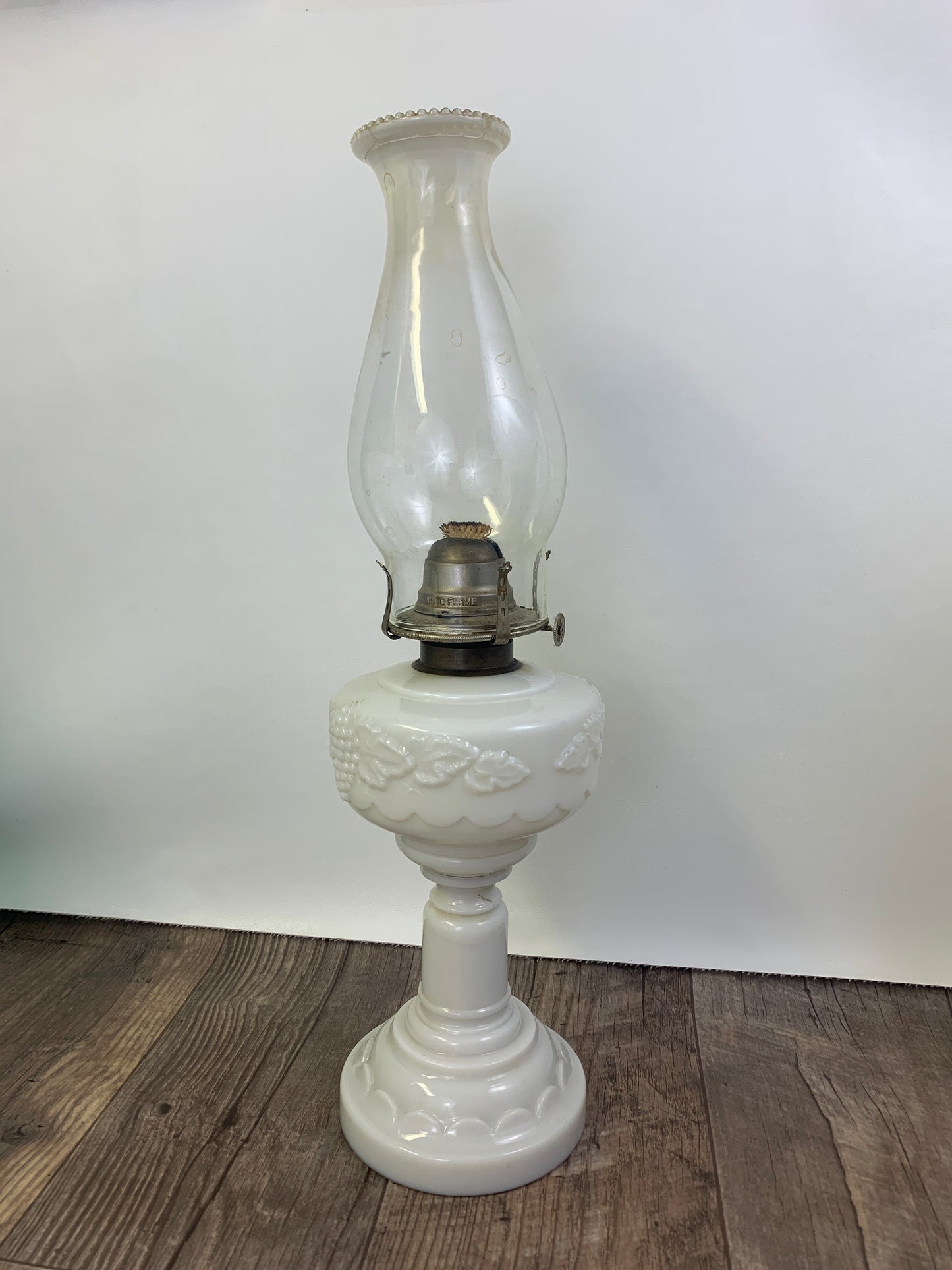 Milk Glass Pedestal Oil Lamp with Grapevine Pattern Early American Oil Lamp Made in USA White Flame Burner Grand Rapids Michigan