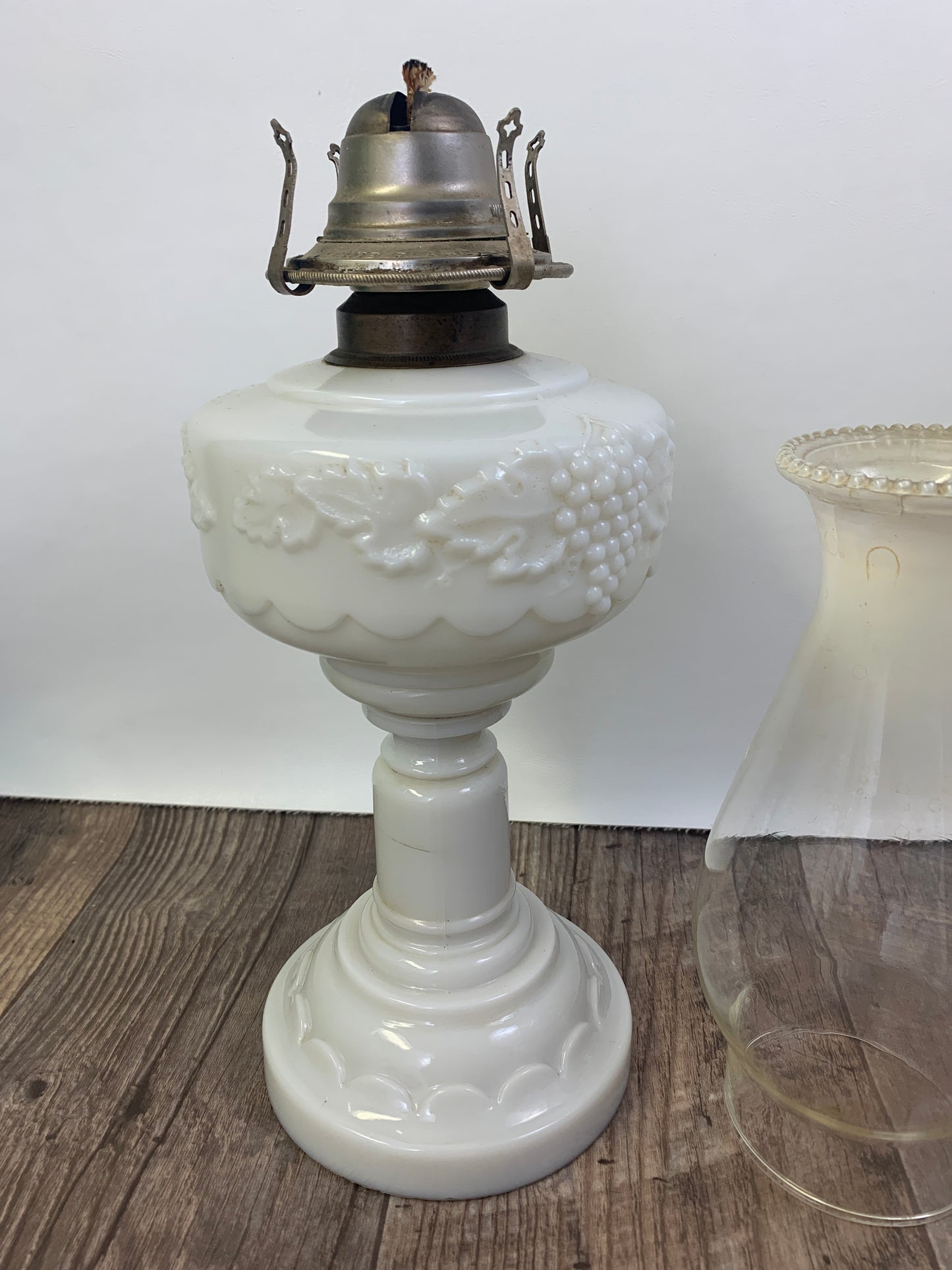 Milk Glass Pedestal Oil Lamp with Grapevine Pattern Early American Oil Lamp Made in USA White Flame Burner Grand Rapids Michigan