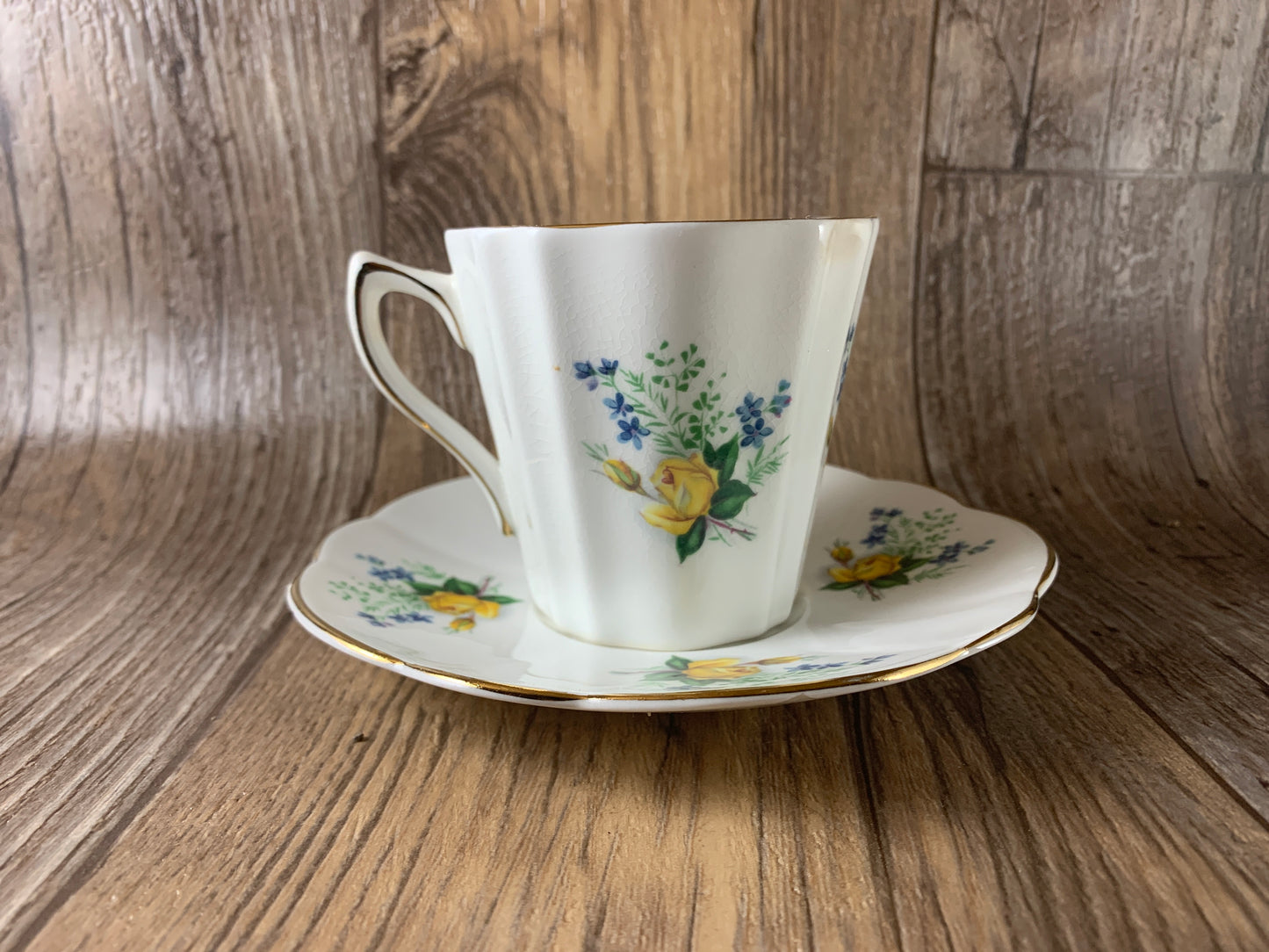 Yellow and Blue Floral Teacup and Saucer
