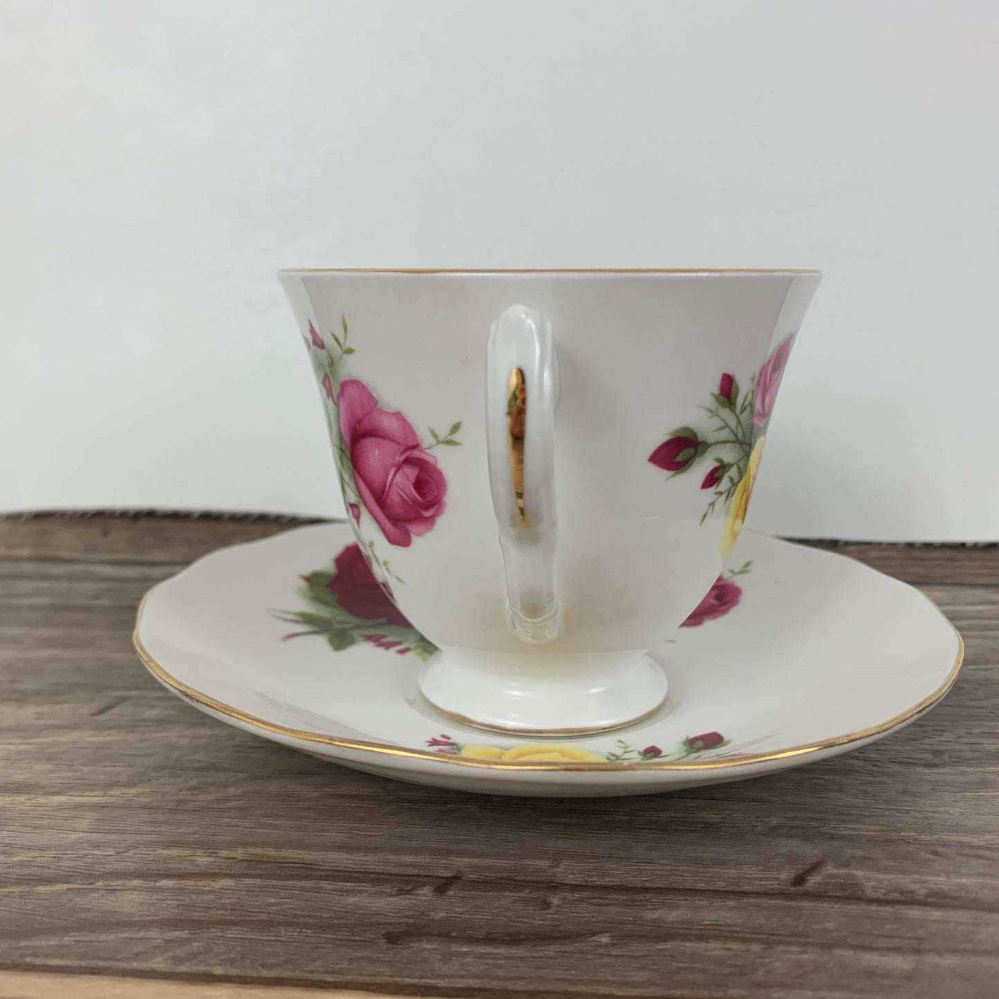 Queen Anne Vintage Teacup with Red, Yellow, and Pink Roses