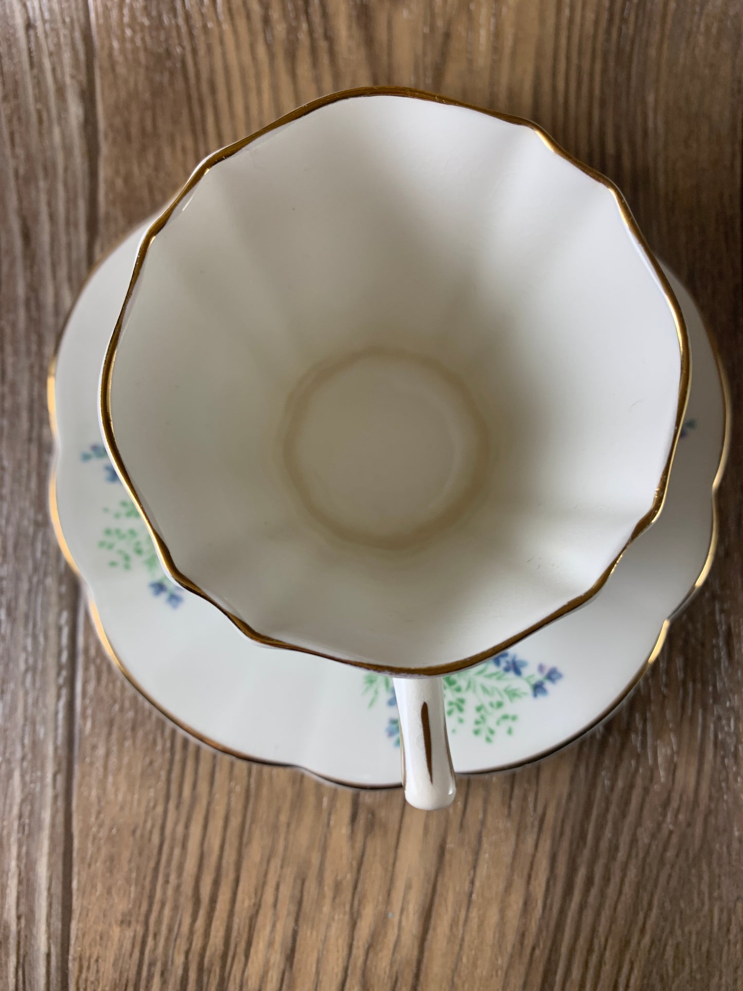 Yellow and Blue Floral Teacup and Saucer