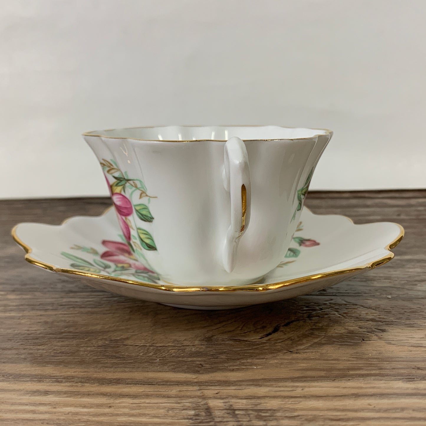 White Tea Cup with Pink Floral Design and Scalloped Edge