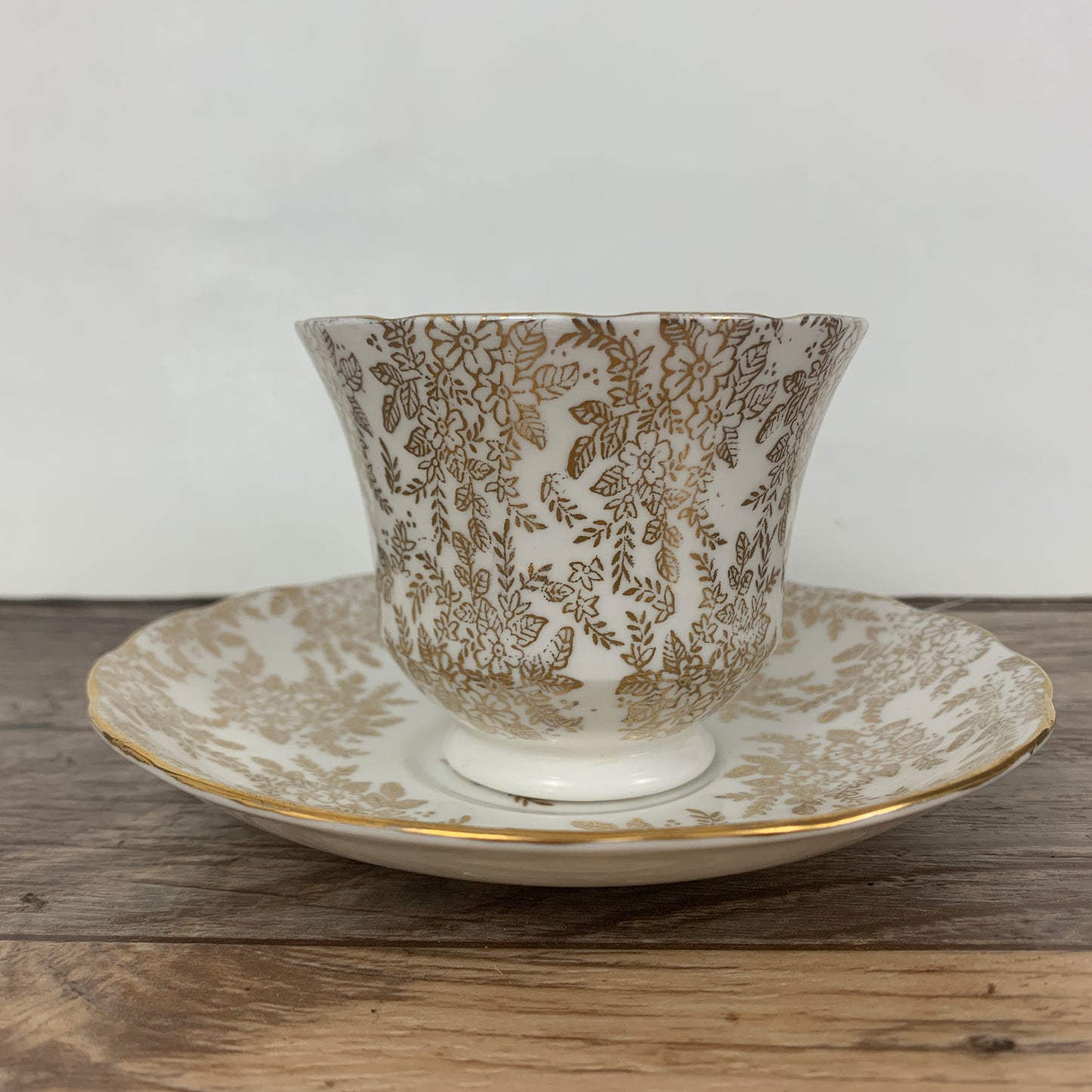 White Teacup with Golden Floral Pattern Vintage Royal Vale Tea Cup