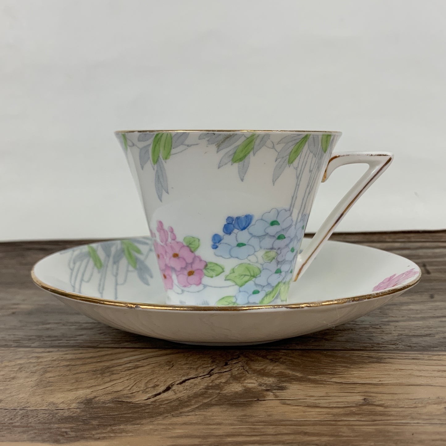 Antique Teacup and Saucer with Triangle Handle Paulette Pattern Standard China
