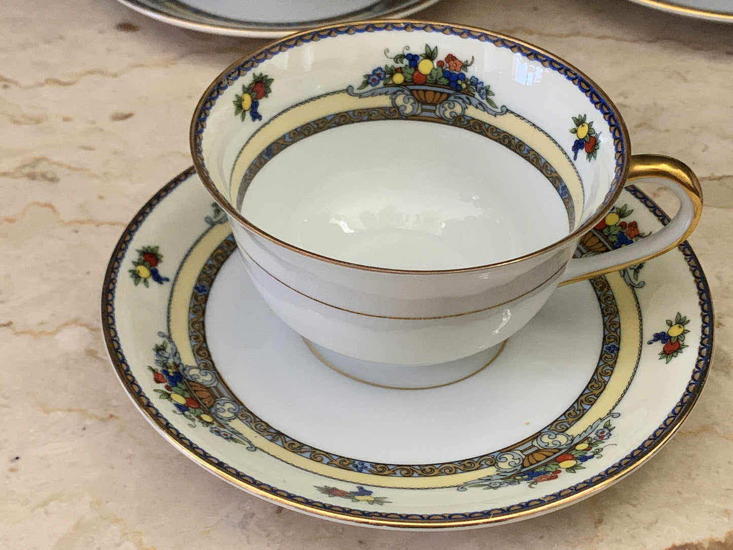 A set of 7 Vintage China Tea Cups Royal Bayruth White with Yellow, Blue, and Gold