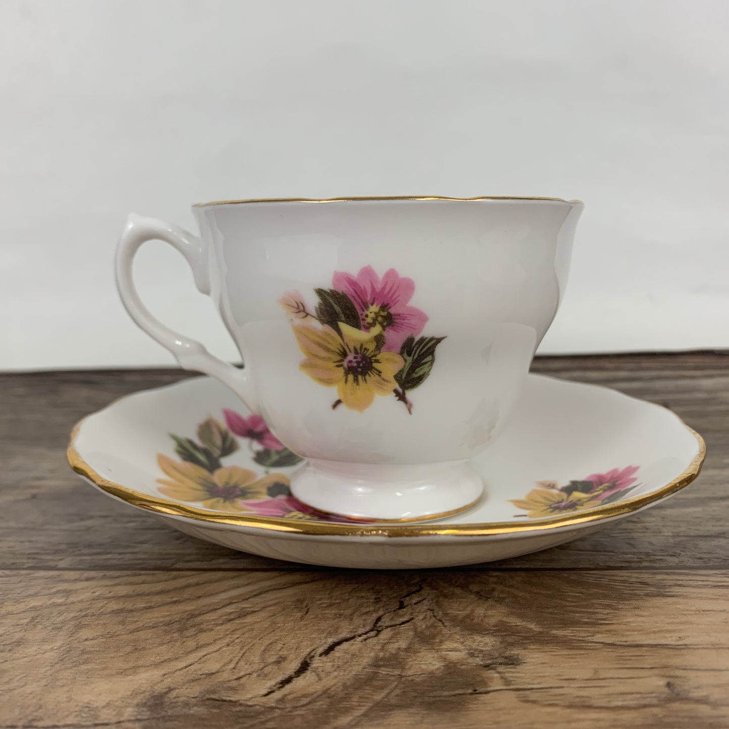 Royal Vale Vintage Teacup and Saucer Set with Pink and Yellow Floral Pattern
