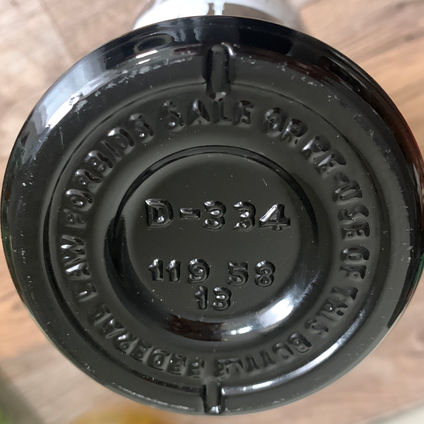 Vintage Black Milk Glass Bottle with Roman Appliqué