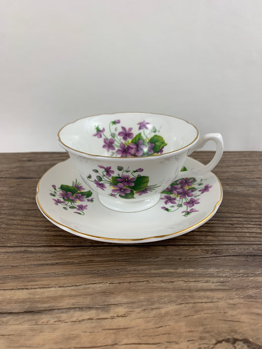 White wide-mouth teacup with purple violets