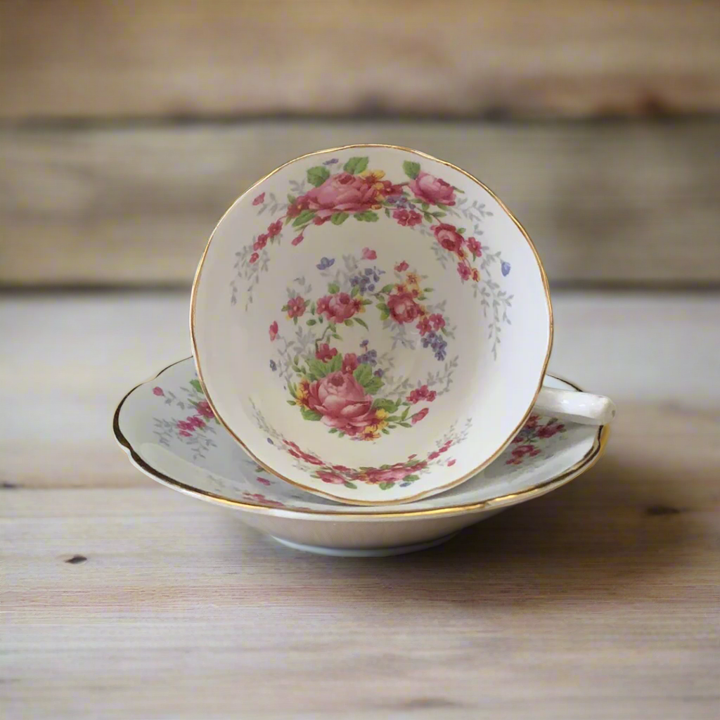 wide mouth teacup with a pink floral pattern