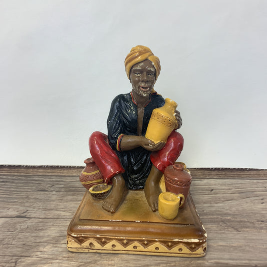 Vintage Chalkware Figure Devonware Old Man Figurine Potter  at a Bazaar