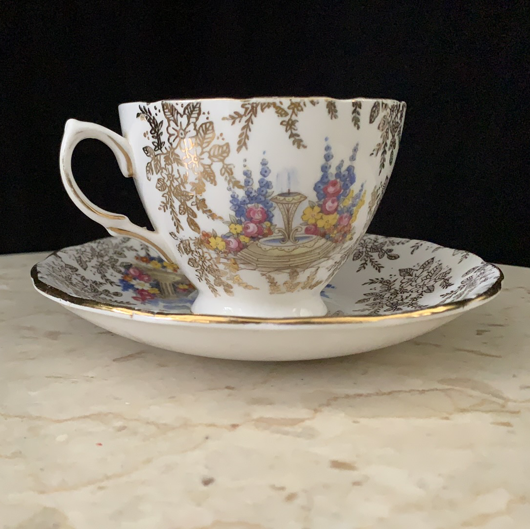 Vintage Tea Cup with Gold Floral Pattern Lady in the Garden