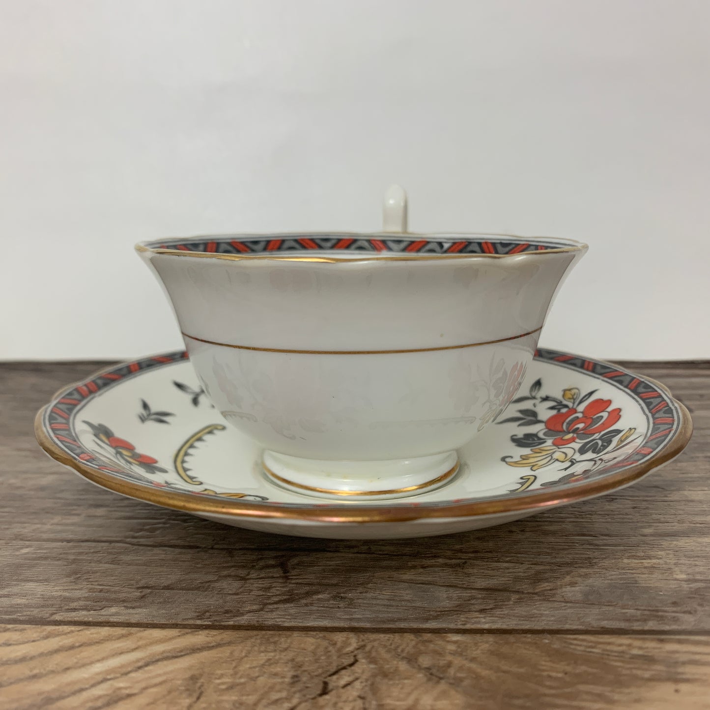 Aynsley Vintage Teacup and Saucer with Black and Orange Pattern