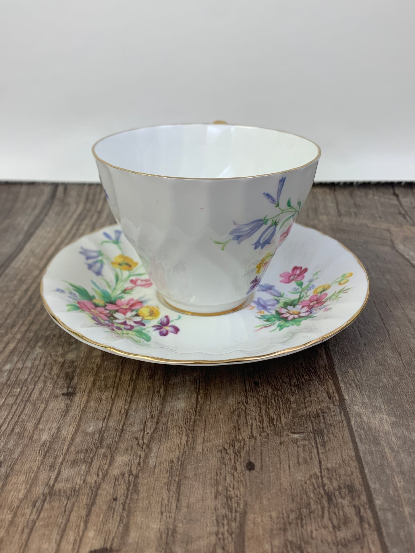 White Vintage Teacup with Floral Pattern Swirled Rib Colourful Flowers
