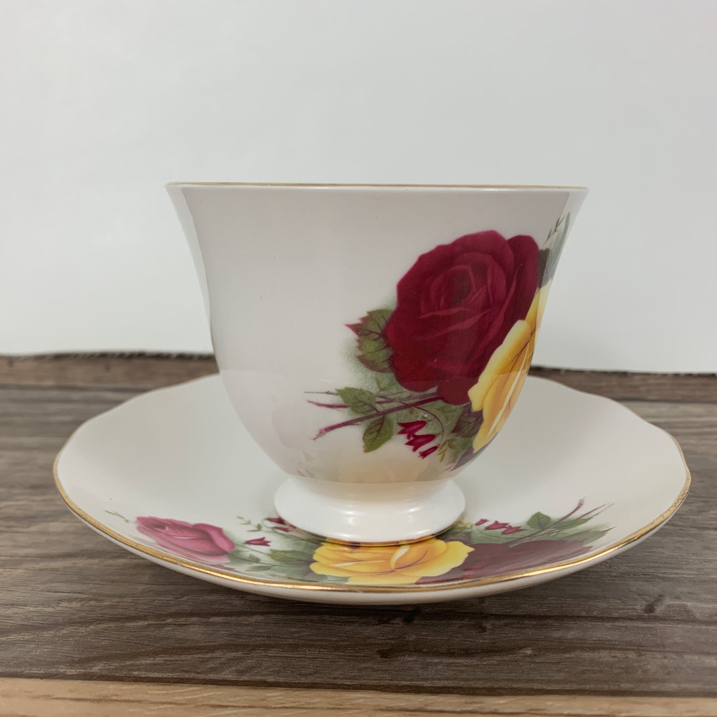 Queen Anne Vintage Teacup with Red, Yellow, and Pink Roses