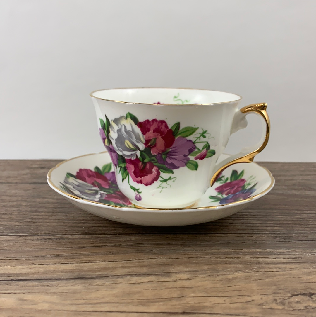 Pink, Purple, and White Floral Vintage Teacup and Saucer by Regency China