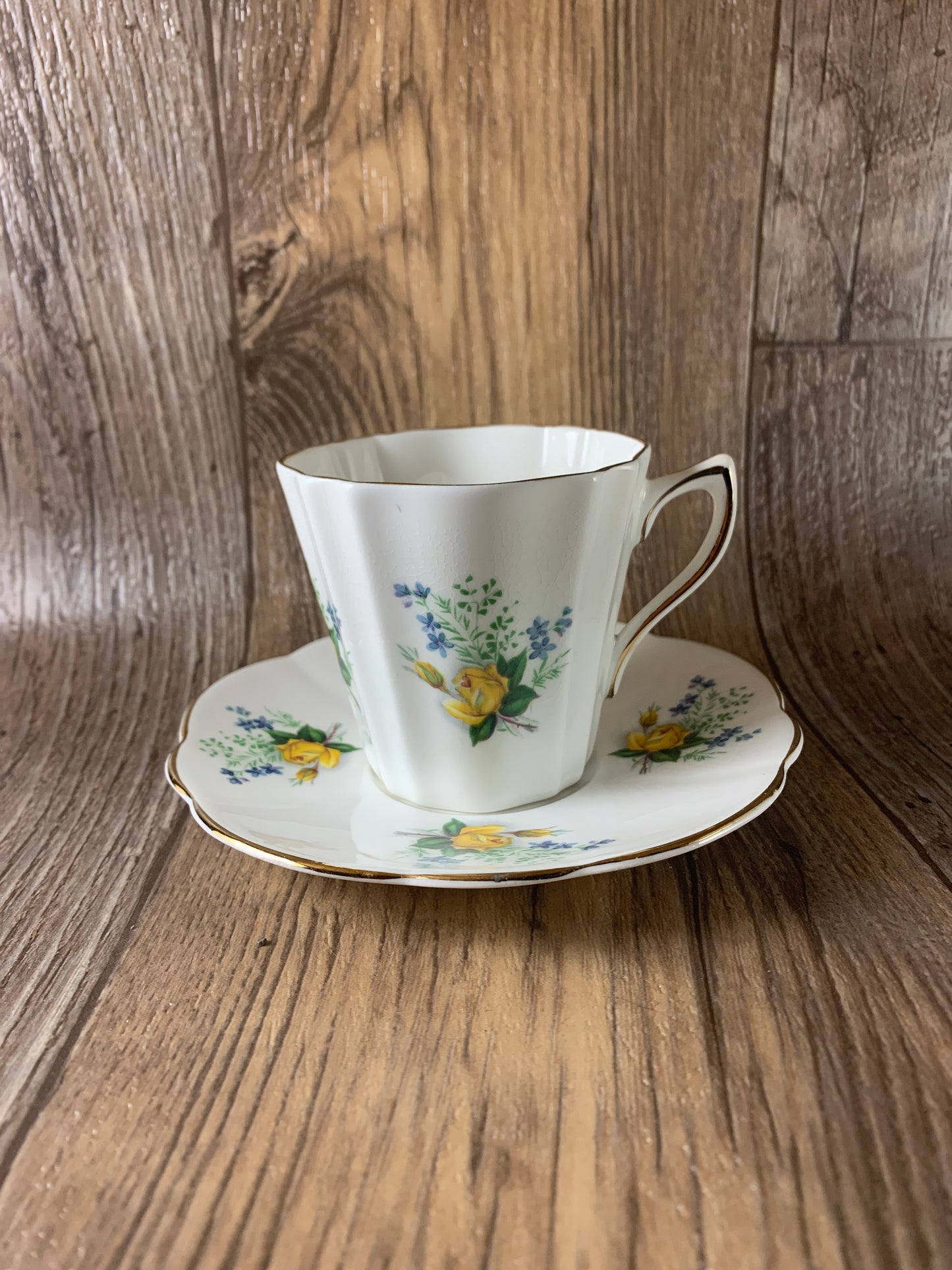 Yellow and Blue Floral Teacup and Saucer