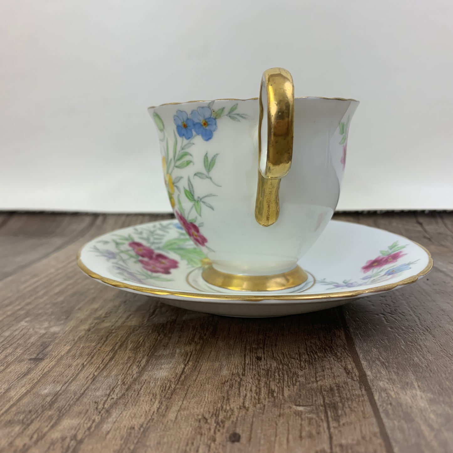 Vintage Teacup Delphine China Hand Painted Tea Cup Pink, Blue, and Yellow Floral Pattern