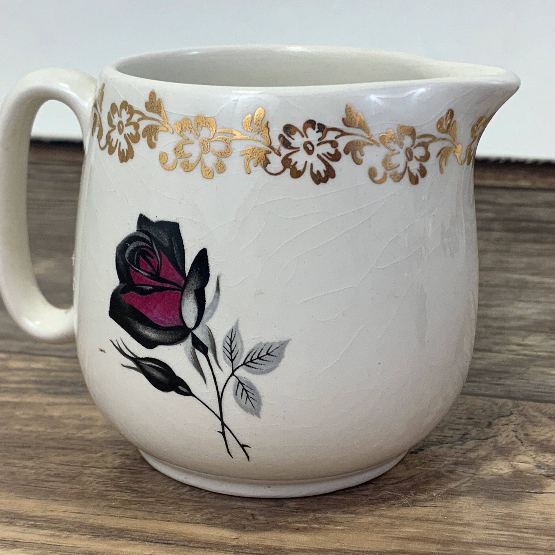 Vintage Creamer with Black and Red Rose