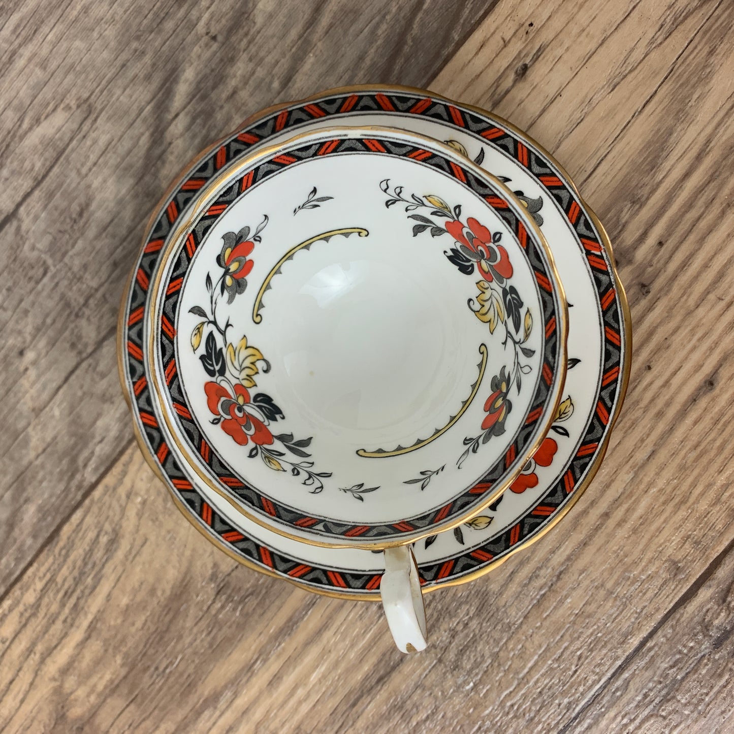 Aynsley Vintage Teacup and Saucer with Black and Orange Pattern