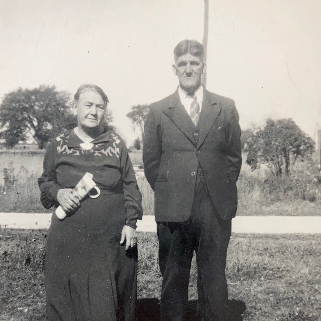 Vintage Photograph of an Older Married Couple standing in a Grassy Park