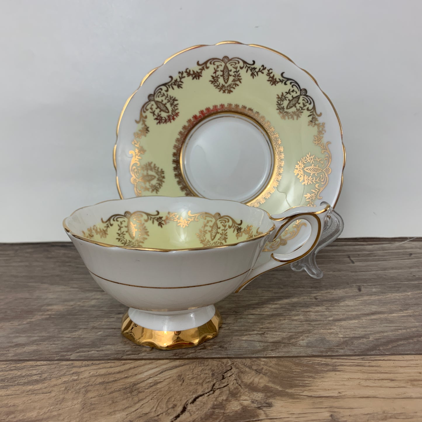 Yellow and Gold Vintage Teacup and Saucer by Royal Stafford