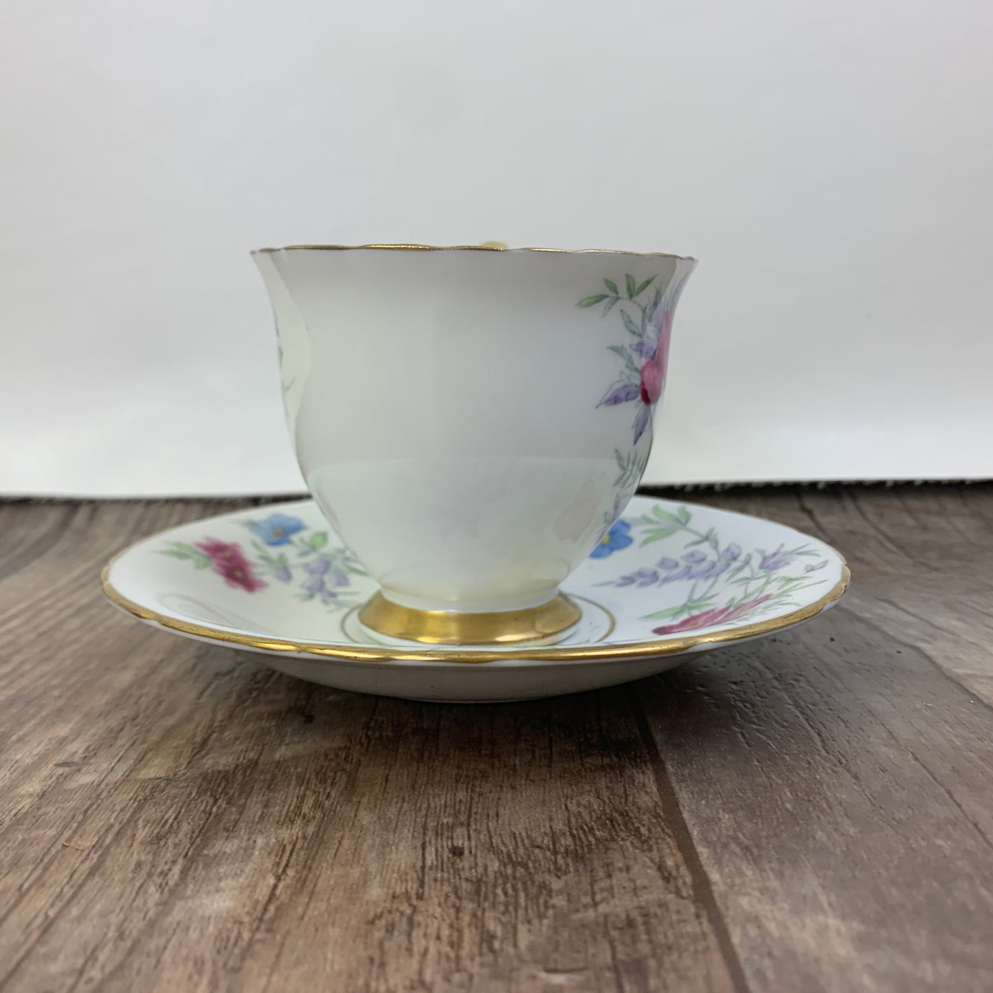 Vintage Teacup Delphine China Hand Painted Tea Cup Pink, Blue, and Yellow Floral Pattern