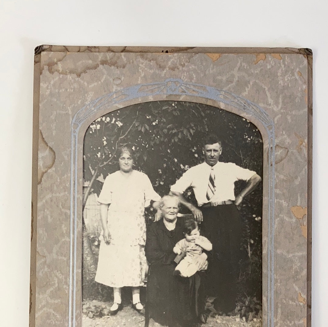 Black and White Vintage Photograph Portrait of a Family Taken Outside