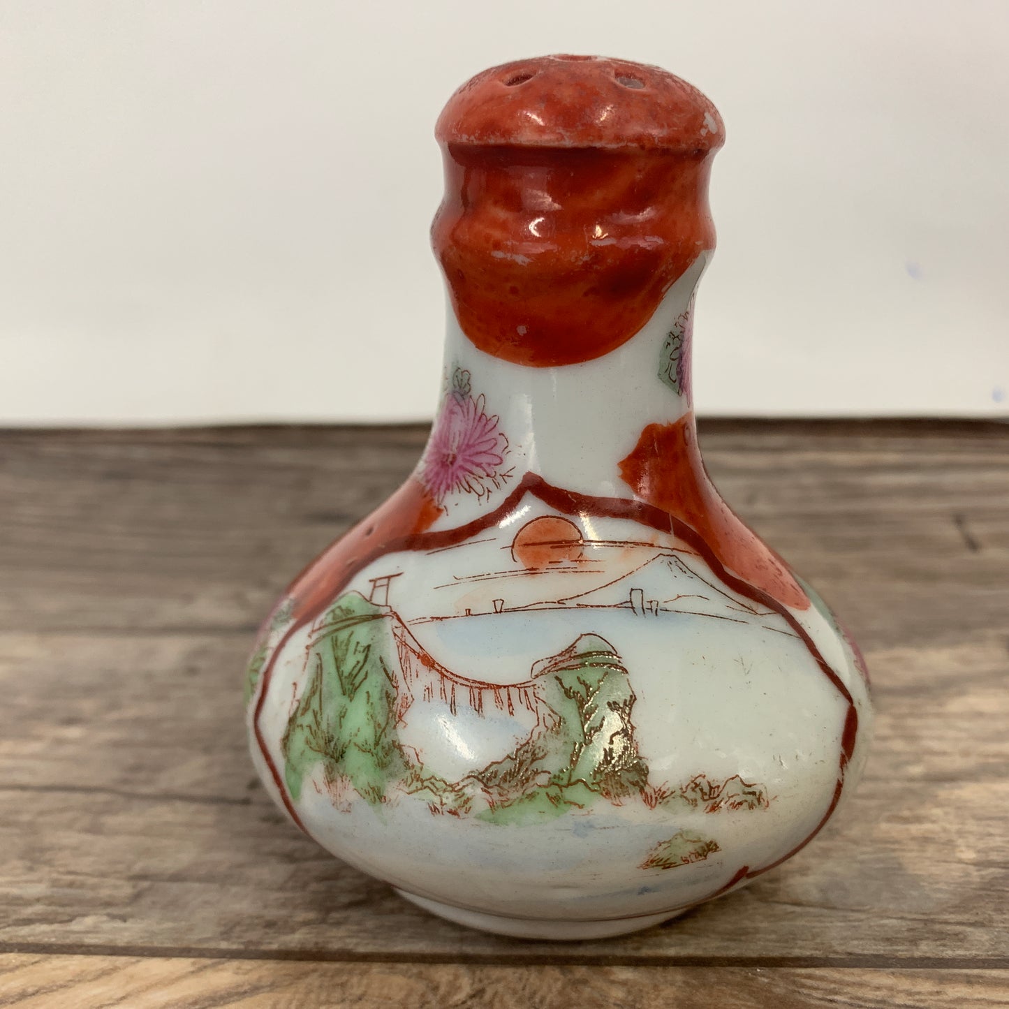 Vintage Salt Shaker with Asian Theme Design